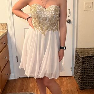 White and gold strapless dress